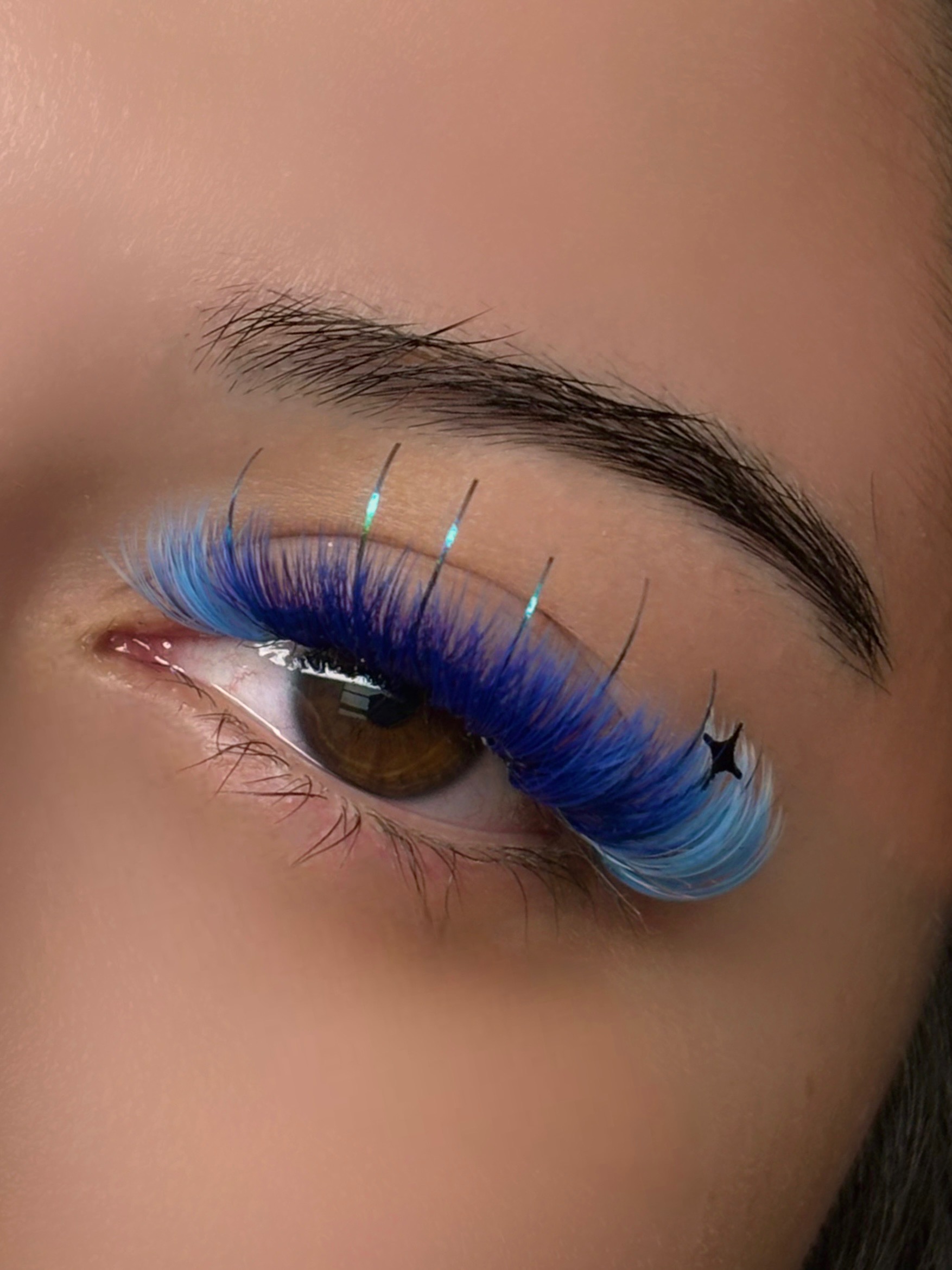 Blue creative lash set with tinsel and star decal